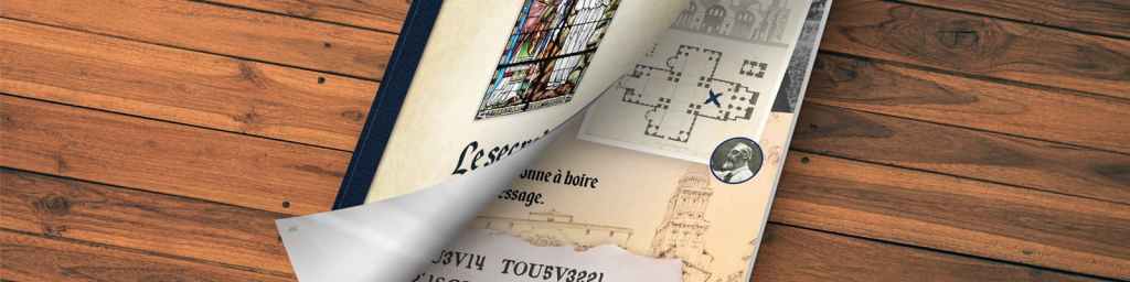 Le livret du Secret du Puy-Saint-Front posé sur un parquet en bois